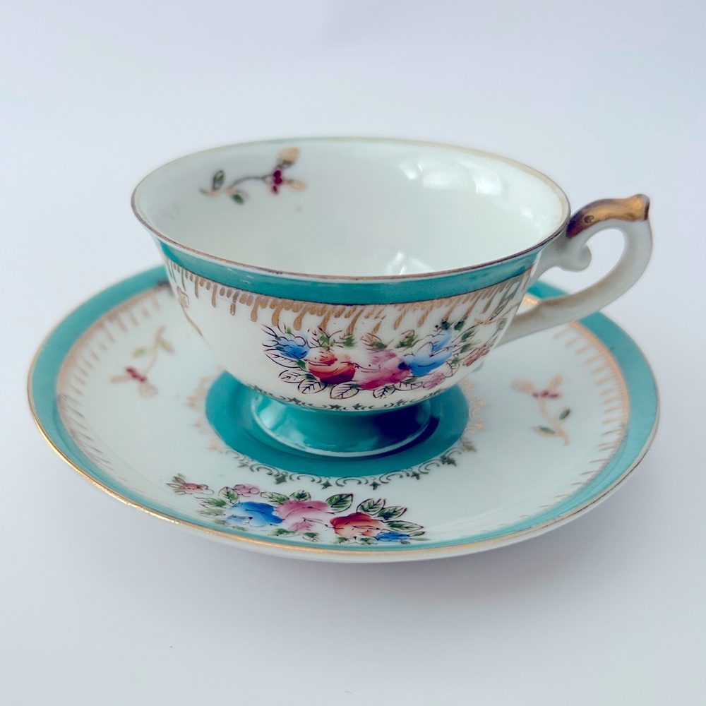 Beautiful floral and gold demitasse cup and saucer made in occupied Japan